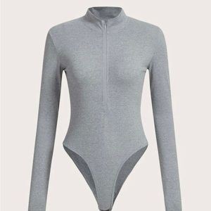 Brand new body suit never worn